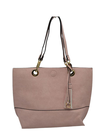 Pink handbag with gold accents on a white background