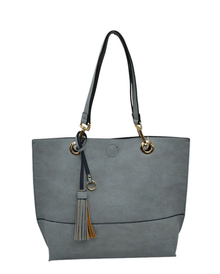 Gray handbag with black handle and tassel on a white background