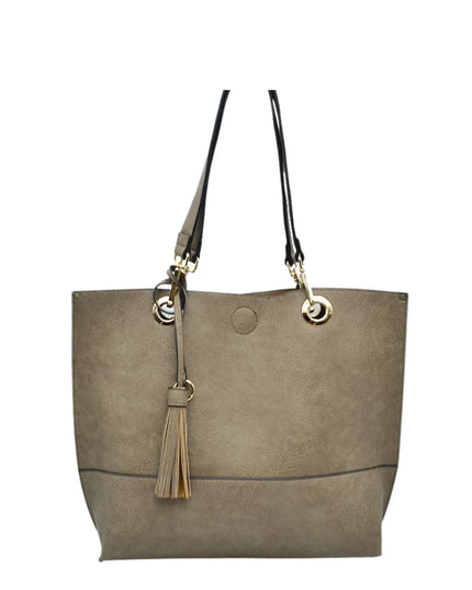 Gray tote bag with black straps and a tassel on a white background