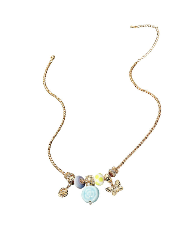 Necklace with colorful beads and charms on a white background