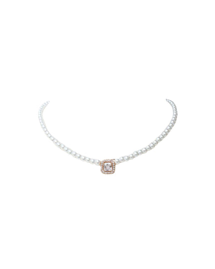 A delicate pearl necklace with a central square rose gold pendant featuring a clear gemstone, displayed on a solid white background.