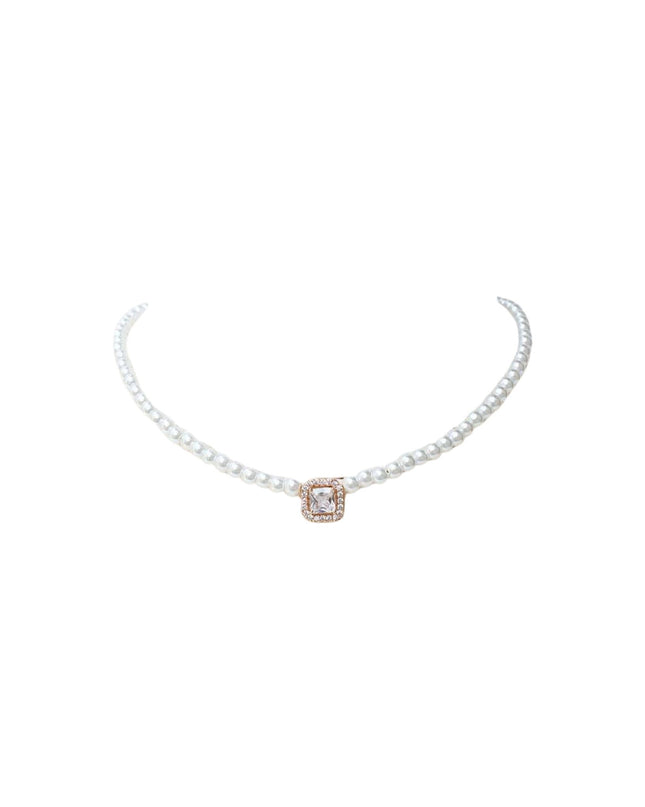 A delicate pearl necklace with a central square rose gold pendant featuring a clear gemstone, displayed on a solid white background.