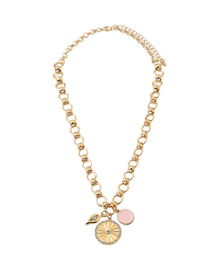 A gold-tone chain necklace with a beaded link style, featuring three hanging charms: a sunburst flower, a small green leaf with a clear rhinestone, and two pink enamel discs, shown on a plain white background.