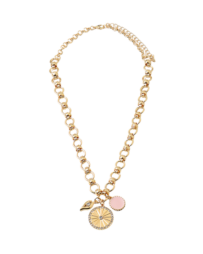 A gold-tone chain necklace with a beaded link style, featuring three hanging charms: a sunburst flower, a small green leaf with a clear rhinestone, and two pink enamel discs, shown on a plain white background.