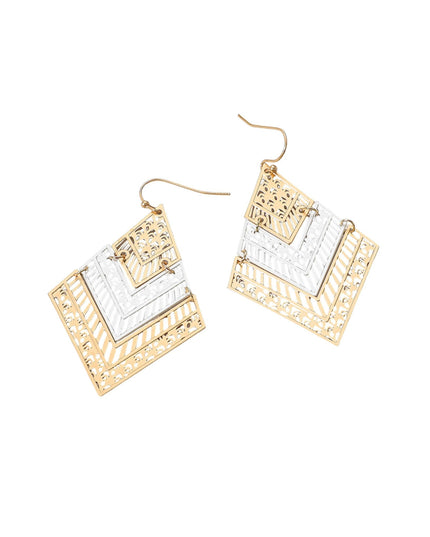 Gold and silver geometric earrings on a white background