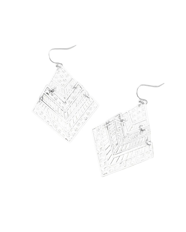 Pair of silver earrings on a white background