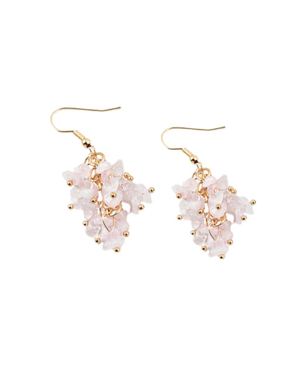A pair of gold-tone dangle earrings featuring clusters of pale pink stone beads and small pearl-like white accents, shown on a plain white background.