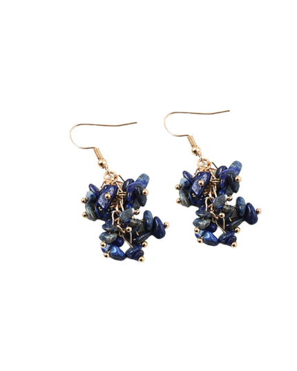 A pair of gold-tone dangle earrings featuring clusters of deep blue lapis lazuli stones, shown against a plain white background.