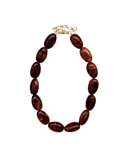 A beaded necklace made of polished oval amber-brown beads with a gold-tone clasp, shown on a plain white background.
