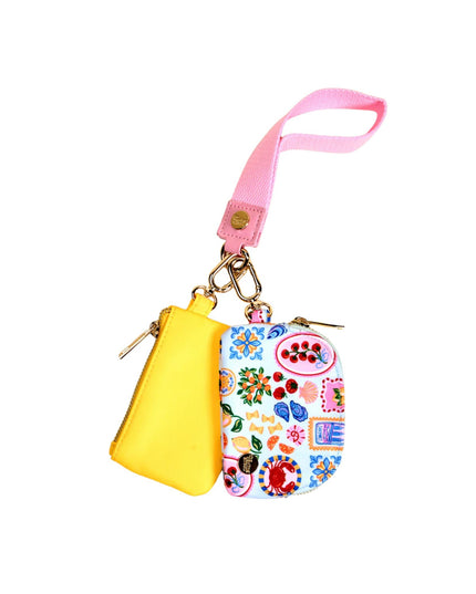 Colorful keychain pouch with floral design on a white background