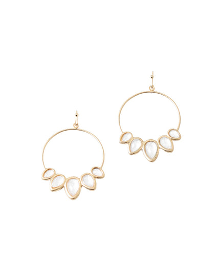 A pair of gold-tone hoop earrings with five teardrop-shaped white faux pearl accents on each earring, displayed against a solid white background.