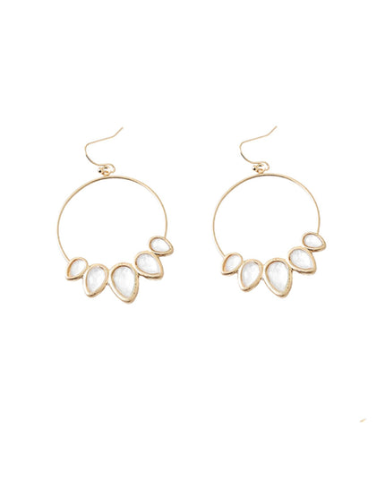 A pair of gold-tone hoop earrings with five teardrop-shaped white inlay stones on each hoop, shown against a plain white background.