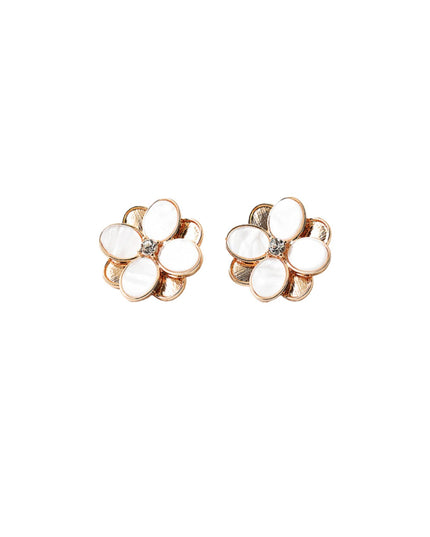 A pair of rose gold flower-shaped stud earrings with white mother-of-pearl petals and a small clear crystal at the center, shown on a plain white background.