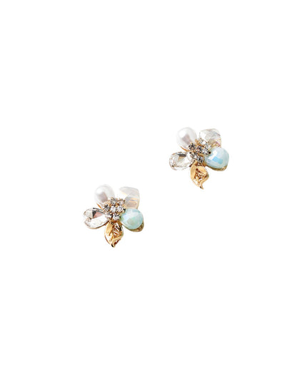 Pair of diamond stud earrings on a white background