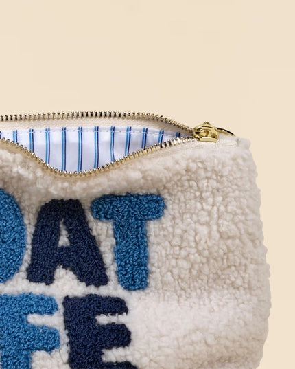 White pouch with blue text 'BOAT LIFE' on a beige background