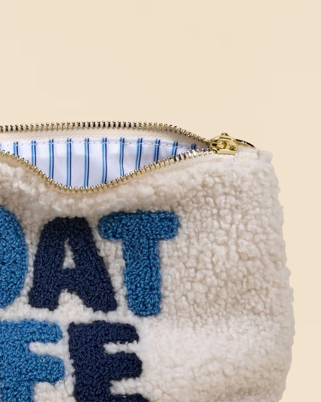 White pouch with blue text 'BOAT LIFE' on a beige background