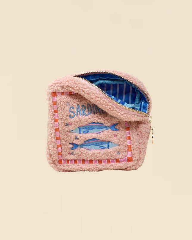 Pink woven pouch with fish design and 'Sardine' text on a beige background