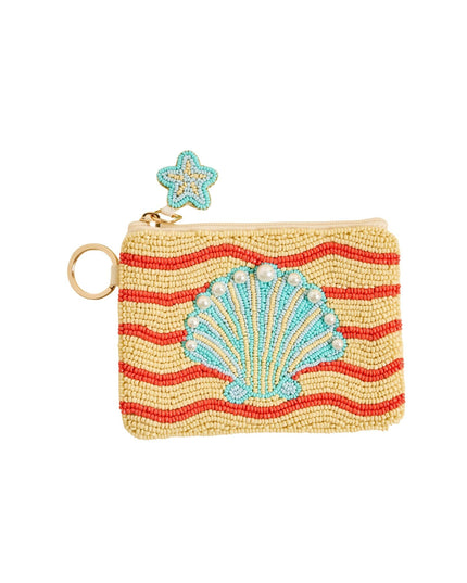 Beaded pouch with shell design and starfish charm on a white background