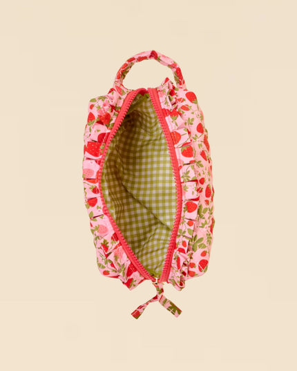 Floral-patterned headband on a beige background