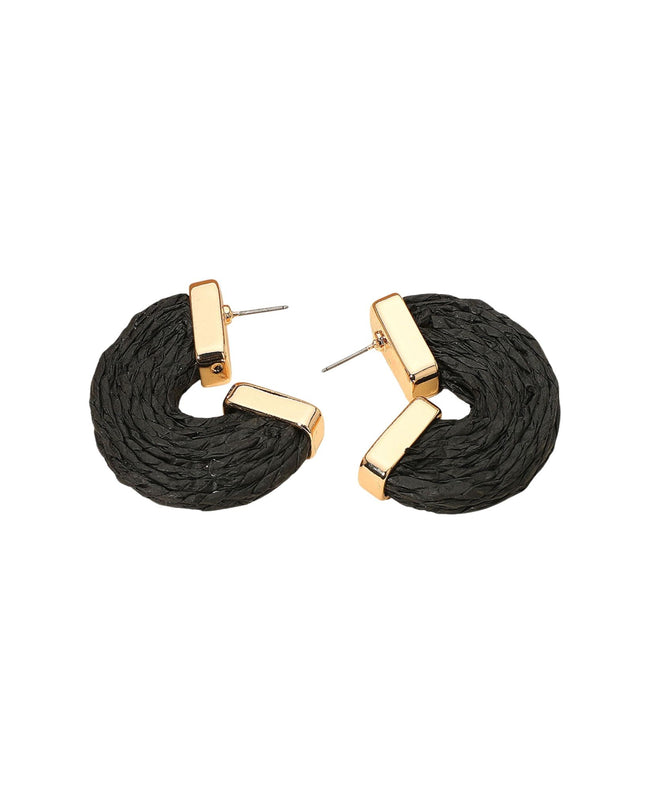 Pair of black hoop earrings with gold accents on a white background