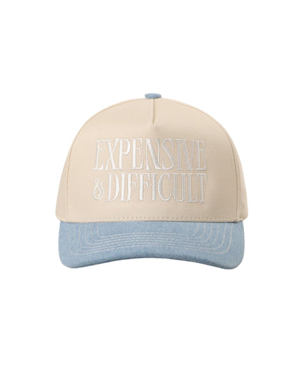 Beige and blue cap with text on a white background