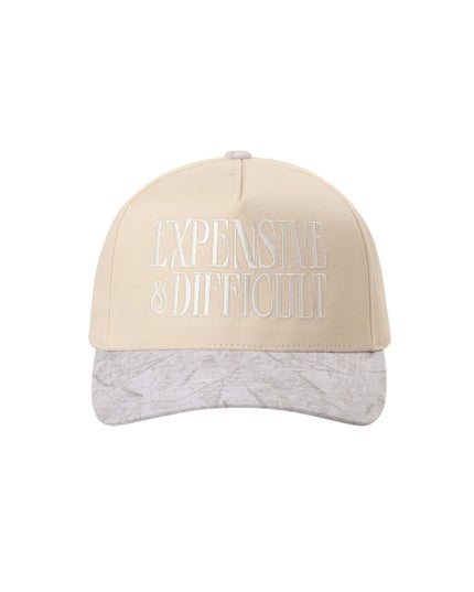 Beige and gray cap with 'EXPENSIVE & DIFFICULT' text on a white background