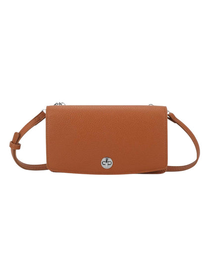 A small pebbled leather crossbody bag in a warm cognac brown, featuring a silver-tone circular logo medallion on the front and a matching adjustable shoulder strap, shown against a plain white background.
