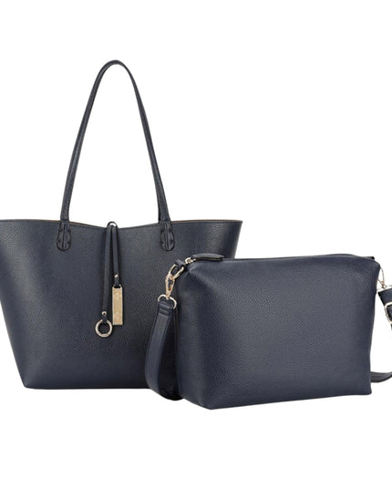 A navy blue pebbled leather tote bag with double shoulder straps and a matching zip-around wristlet pouch with a detachable strap, displayed on a clean white background.