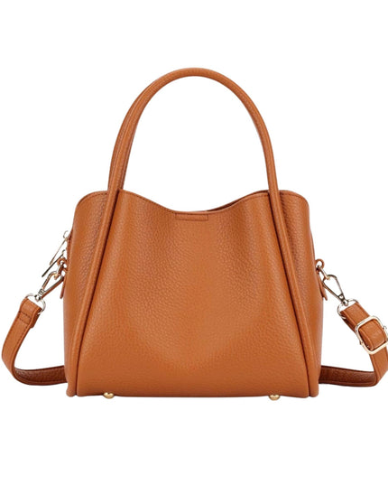 A tan pebbled leather handbag with dual top handles and a detachable shoulder strap, shown against a plain white background.