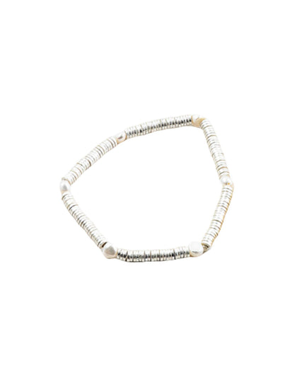 A beaded stretch bracelet with alternating white and silver textured beads, arranged in a hexagonal shape on a plain white background.