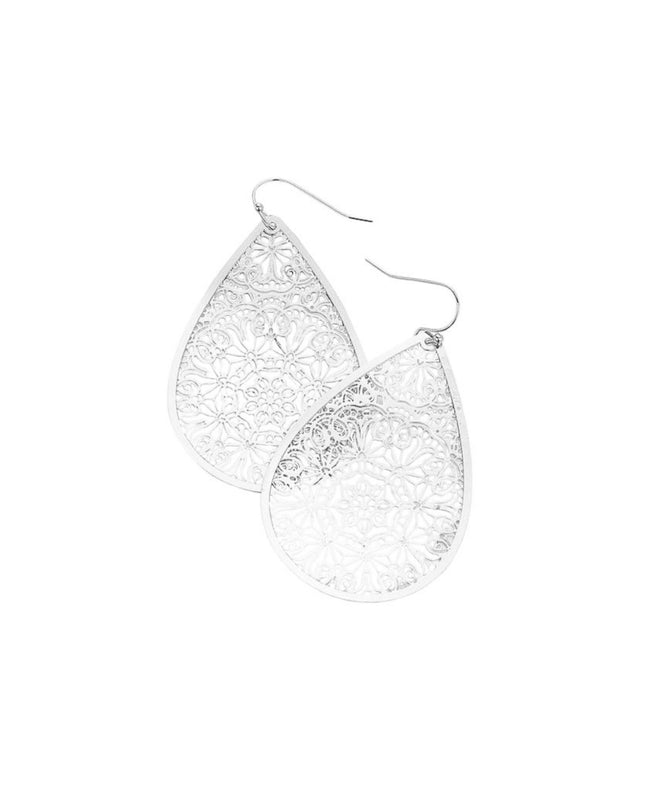 Silver earrings with intricate design on a white background