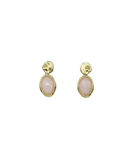 A pair of gold drop earrings featuring a small textured gold top and an oval pale pink stone below, set against a plain white background.