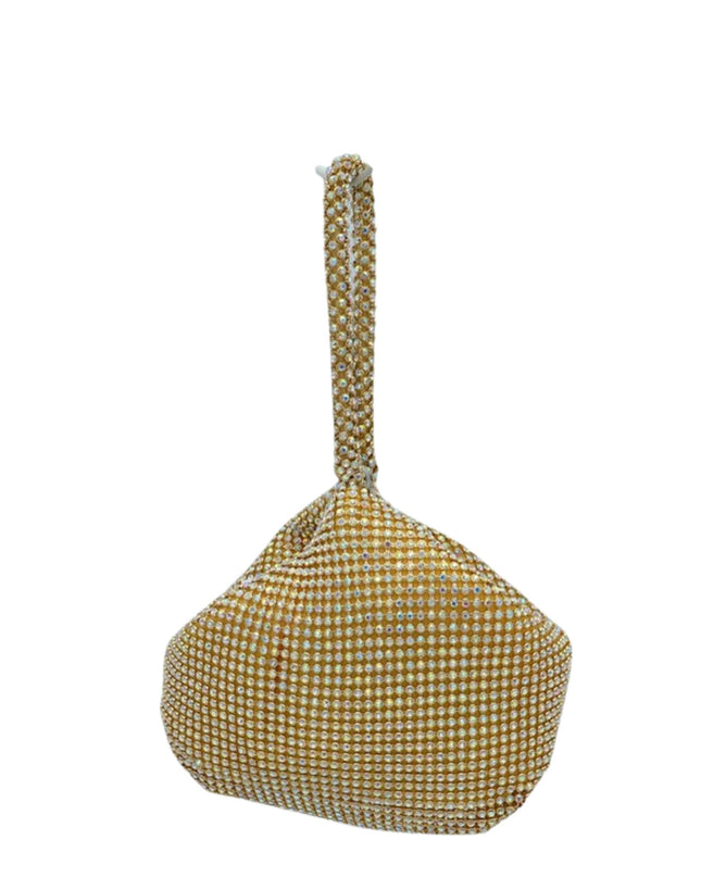 Gold beaded handbag on a white background