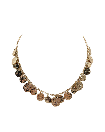 A gold-toned statement necklace featuring multiple textured, disc-like charms in varying sizes, displayed against a solid white background.