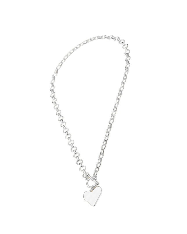 Silver bracelet with a heart-shaped charm on a white background