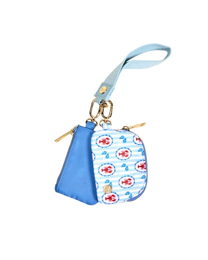 Small blue pouch with a patterned flap on a white background