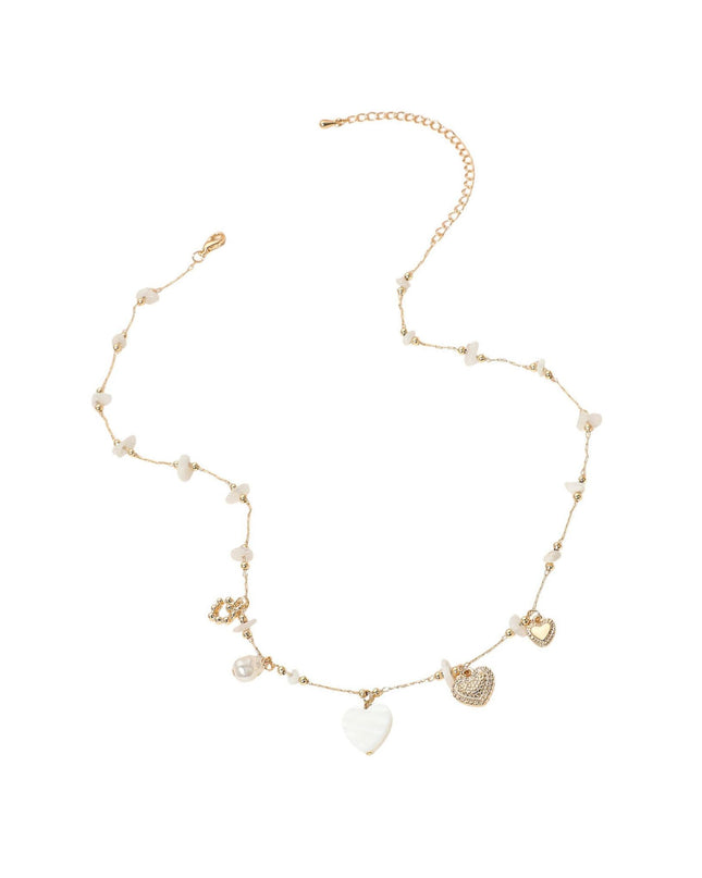 Delicate necklace with heart-shaped pendants on a white background