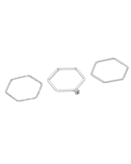 Set of three hexagonal silver rings on a white background