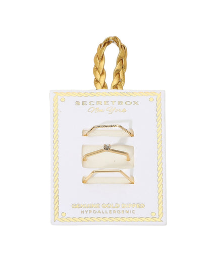 Gold hair clips in packaging with 'Secret Box' branding on a white background