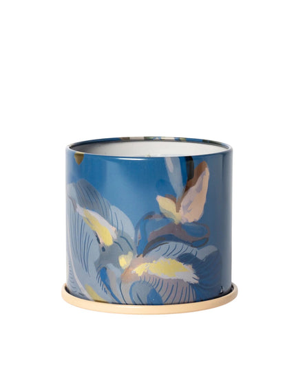 Decorative container with bird design on a blue background