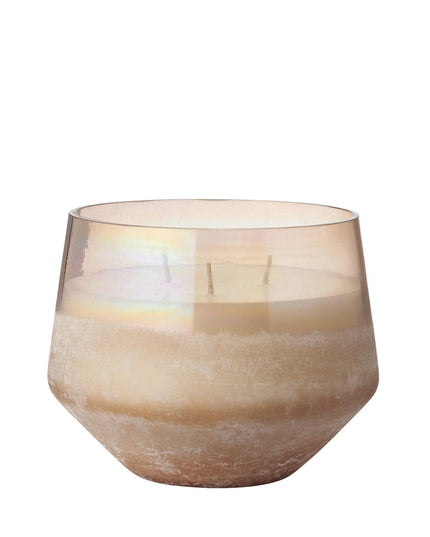 Glass candle holder with a beige tint on a white background