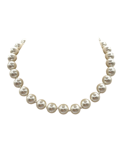 A classic strand of white freshwater pearls arranged in a curved U-shape on a solid white background.