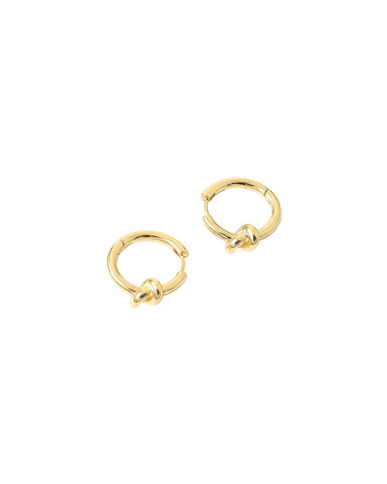 A pair of small gold huggie hoop earrings with a knotted detail at the front, shown on a plain white background.