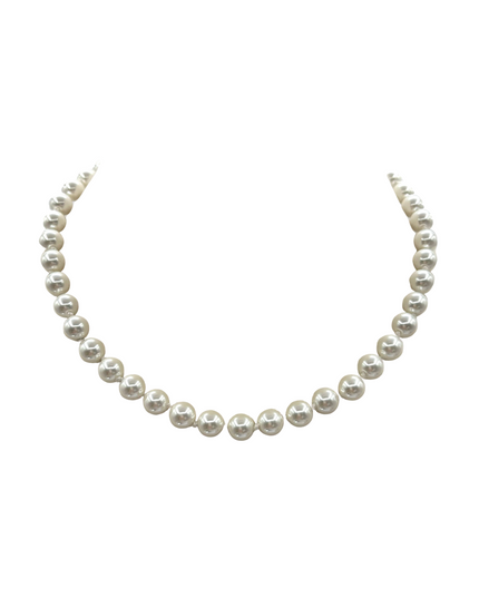 A classic pearl necklace composed of uniform, round white pearls strung on a silver-toned chain, displayed against a solid white background.