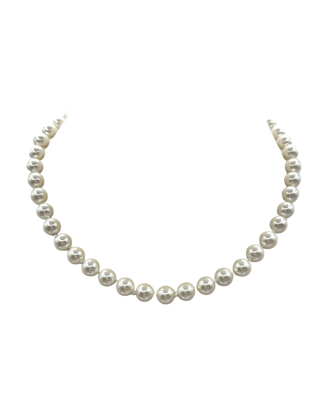 A classic pearl necklace composed of uniform, round white pearls strung on a silver-toned chain, displayed against a solid white background.