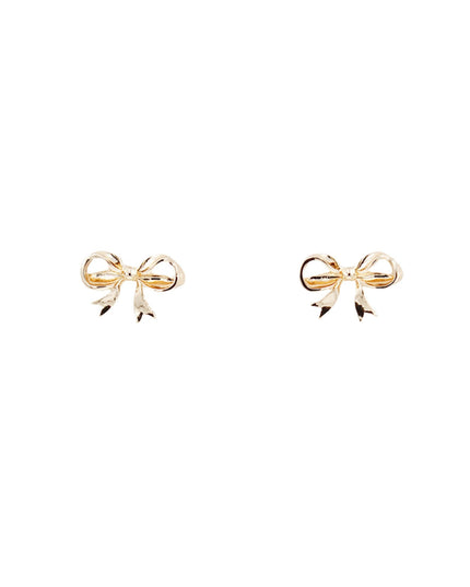 A pair of gold bow stud earrings on a plain white background.