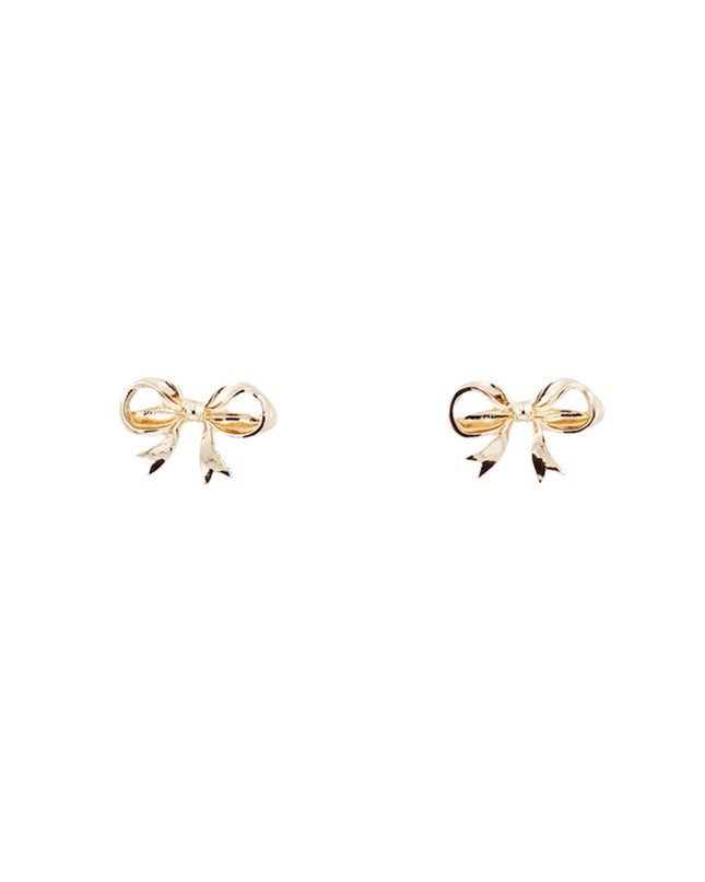 A pair of gold bow stud earrings on a plain white background.