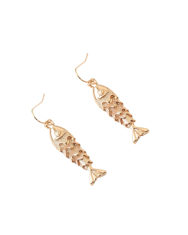 A pair of gold fish-shaped dangle earrings with detailed scale patterns, shown on a plain white background.