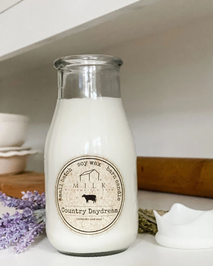 Glass bottle of milk with a label on a kitchen counter