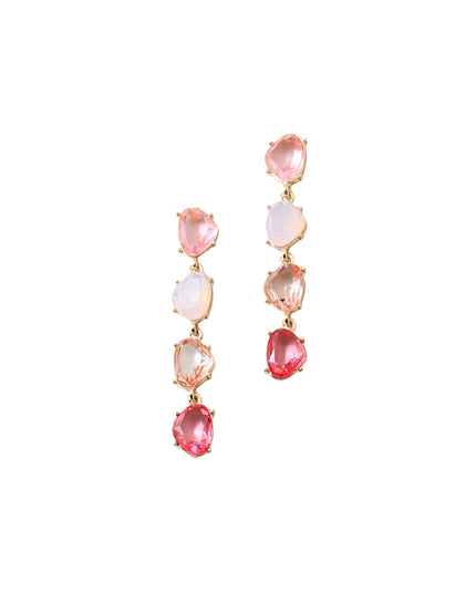 A pair of gold drop earrings featuring a vertical sequence of teardrop-shaped pink and white gemstones, set against a plain white background.